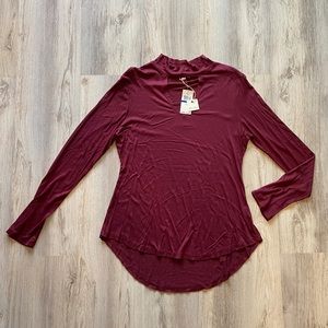 Ultra Flirt long sleeved knit top w/ cutout